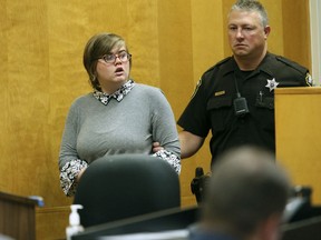 In this Sept. 29, 2017 file photo, Morgan Geyser, one of two Wisconsin girls charged with stabbing a classmate, Payton Leutner, in 2014, to impress the fictitious horror character Slender Man, enters a Waukesha County Court for a status hearing in Waukesha, Wis.