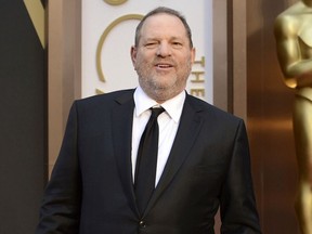 In this March 2, 2014 file photo, movie mogul Harvey Weinstein arrives at the Oscars at the Dolby Theatre in Los Angeles.