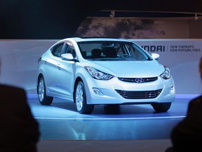 Hyundai introduces the 2013 Hyundai Elantra Coupe during the media preview of the Chicago Auto Show at McCormick Place in Chicago on Wednesday, Feb. 8, 2012. Transport Canada says Hyundai is recalling 103,556 Elantra cars from the 2013-2014 model years to fix a problem with their braking system.