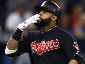 Carlos Santana of the Cleveland Indians celebrates after hitting a solo home run against Marco Estrada of the Toronto Blue Jays on Oct. 19, 2016