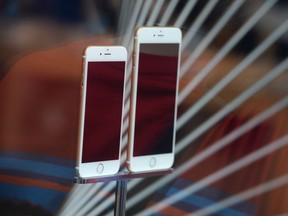 File photo dated September 19, 2014 shows the iPhone 6 and 6 Plus on display at the Apple store in Pasadena, California. (ROBYN BECK/AFP/Getty Images)