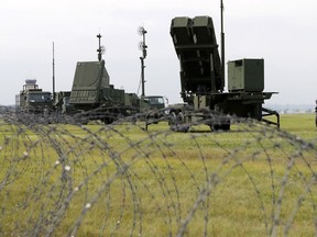 In this Aug. 29, 2017, file photo, Japan Air Self-Defense Force demonstrates a training to utilize the PAC-3 surface to air interceptors at the U.S. Yokota Air Base on the outskirts of Tokyo.