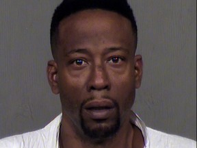 In this Monday, Dec. 25, 2017, photo provided by Maricopa County Sheriff's Office shows suspect Anthony Ross in Phoenix, Ariz. Ross is accused of shooting and killing his estranged wife and their two children at a Phoenix apartment complex before getting into a Christmas Day shootout with officers, authorities said Tuesday, Dec. 26. (Maricopa County Sheriffs Office via AP)