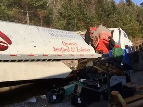 A crash involving a tractor trailer carrying lobster and fishes closes down Highway 103 in Nova Scotia. (Twitter/NateTWN)