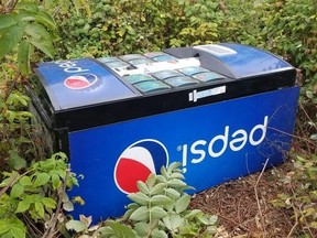 The RCMP in Saint-Léonard, N.B. are asking for the public's help in locating the owner of a Pepsi vending machine, shown in a handout photo, found in a potato field southwest of Grand Falls.