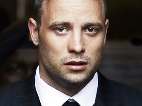 In this Wednesday, June 15, 2016, file photo, Oscar Pistorius leaves the High Court in Pretoria, South Africa, after his sentencing proceedings. The Pistorius case is back in court, Friday, Nov. 3, 2017, with prosecutors seeking a longer jail sentence for the double-amputee athlete after he was found guilty of murder for shooting his girlfriend, Reeva Steenkamp. (AP Photo/Themba Hadebe, File)