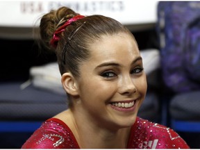 In this Aug. 17, 2013 file photo McKayla Maroney smiles after competing on the floor exercise during the U.S. women's national gymnastics championships in Hartford, Conn. Maroney says the group that trains U.S. Olympic gymnasts forced her to sign a confidential settlement to keep allegations of sexual abuse by the team's doctor secret. Maroney filed a lawsuit Wednesday, Dec. 20, 2017, in Los Angeles, against the United States Olympic Committee and USA Gymnastics. The suit also seeks damages from Michigan State University, where the team's doctor, Larry Nassar, worked for decades.