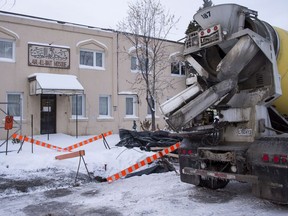 Construction goes on in front of the Ahl-Ill-Bait mosque, Wednesday, December 13, 2017 in Montreal.