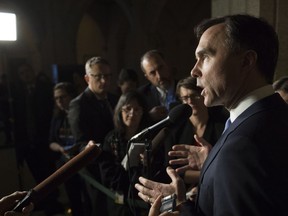 Finance Minister Bill Morneau talks to media on tax changes for small businesses in Ottawa on Wednesday, Dec. 13, 2017.