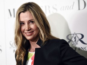In this April 28, 2016, file photo, Mira Sorvino, a cast member in "Mothers and Daughters," poses at the premiere of the film at the London West Hollywood Hotel Screening Room in West Hollywood, Calif. The Oscar-winning actress wrote a guest column in The Hollywood Reporter on Friday, Dec. 8, 2017, that says she's still glad she revealed her sexual misconduct allegations against Harvey Weinstein despite facing a backlash by some who accuse her of keeping silent in order to save her career.