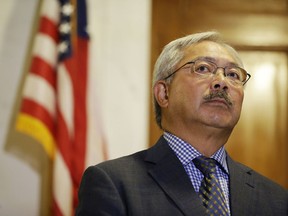 In this Aug. 15, 2017, file photo, San Francisco Mayor Ed Lee listens to questions during a news conference at City Hall in San Francisco.