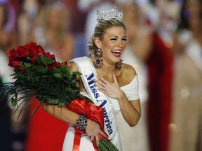 In this Jan. 12, 2013 file photo, Miss New York Mallory Hytes Hagan reacts as she is crowned Miss America 2013 in Las Vegas.  (AP Photo/Isaac Brekken, File)