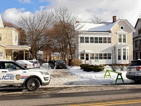 Troy police investigate multiple deaths at 158 Second Ave. on Tuesday, Dec. 26, 2017, in Troy, N.Y.  (Lori Van Buren/The Albany Times Union via AP)