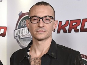 In this Dec. 13, 2014 file photo, Chester Bennington poses in the press room at the 25th annual KROQ Almost Acoustic Christmas in Inglewood, Calif.