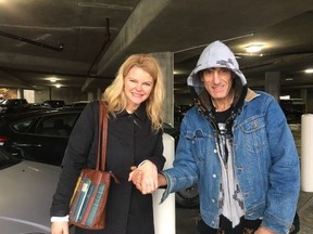 Trinda Gajek, left, and Raymond Ahlstrom pose after the return of her lost ring in Nanaimo, B.C., in this recent handout photo.  THE CANADIAN PRESS/Trinda Gajek