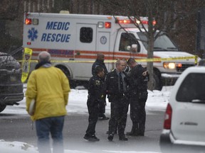 Authorities investigate the scene of a shooting at the Penn State University campus in Beaver County in Monaca, Pa., Wednesday, Dec. 13, 2017.