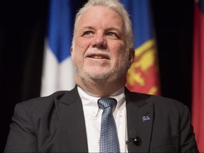 Quebec Premier Philippe Couillard attends the Confederation of Tomorrow 2.0 Conference with Ontario Premier Kathleen Wynne in Toronto on Tuesday Dec. 12, 2017.