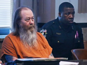 In this Wednesday, Oct. 18, 2017 file photo, William Reece, left, waits for a hearing to begin in Oklahoma City.  (AP Photo/Sue Ogrocki, File)