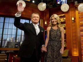 FILE - In this Friday, Nov. 18, 2011, file photo, Regis Philbin and Kelly Ripa appear on Regis' farewell episode of "Live! with Regis and Kelly", in New York.