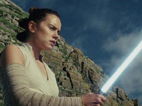 This image released by Lucasfilm shows Daisy Ridley as Rey in "Star Wars: The Last Jedi," in theaters on Dec. 15. (Lucasfilm via AP)