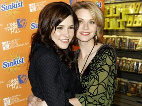 Actresses Hilarie Burton and Sophia Bush arrive at the midtown FYE store to sign copies of the new 'One Tree Hill' soundtrack CD on February 7, 2006 in New York City. (Photo by Mat Szwajkos/Getty Images)