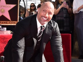 Actor Dwayne Johnson attends a ceremony honouring him with the 2,624th star on the Hollywood Walk of Fame on December 13, 2017 in Hollywood, California.  (Alberto E. Rodriguez/Getty Images)