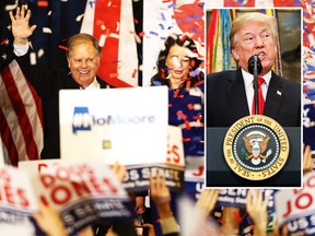 Democratic U.S. Senator elect Doug Jones (L) and wife Louise Jones (R) greet supporters during his election night gathering the Sheraton Hotel on December 12, 2017 in Birmingham, Alabama.  Doug Jones defeated his republican challenger Roy Moore to claim Alabama's U.S. Senate seat that was vacated by attorney general Jeff Sessions. (Photo by Justin Sullivan/Getty Images)