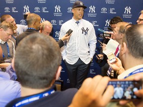 New Yankee Giancarlo Stanton answers questions for the media during Major League Baseball winter meetings on Dec. 11, 2017