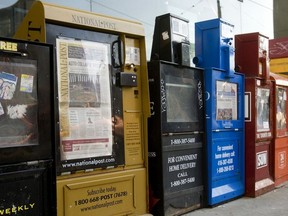 File photo of newspaper boxes in downtown Toronto, Friday April 17, 2009.
