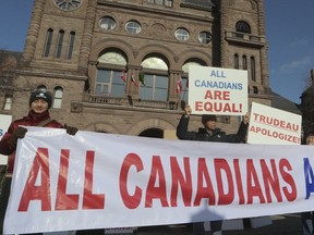 Demonstrators called for Prime Minister Justin Trudeau to apologize for his handling of the hijab hoax. (VERONICA HENRI, Toronto Sun)