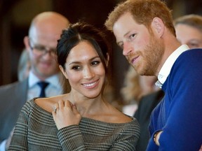 Prince Harry and his fiancee Meghan Markle (AFP PHOTO/GETTY IMAGES)