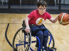 Cameron Imrie, 9, who has CP, posed for a photo at Variety Village in Toronto, Ont. on Jan. 23. (ERNEST DOROSZUK, Toronto Sun)