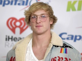 In this Dec. 1, 2017 file photo, YouTube personality Logan Paul arrives at Jingle Ball in Inglewood, Calif. Paul has returned to YouTube with a 7-minute suicide prevention video he hopes will “make a difference in the world.” He was suspended by YouTube after posting video of him in a forest in Japan near what seemed to be a body hanging from a tree. The location is known in Japan as a frequent site for suicides.