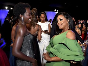 Lupita Nyong'o, left, and Niecy Nash attend the 24th annual Screen Actors Guild Awards at the Shrine Auditorium & Expo Hall on Sunday, Jan. 21, 2018, in Los Angeles.