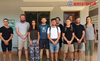 In this photo dated Jan. 27, 2018, issued by Cambodian National Police, a group of foreigners stand after they were arrested for “dancing pornographically” at a party in Siem Reap town, near the country’s famed Angkor Wat temple complex.