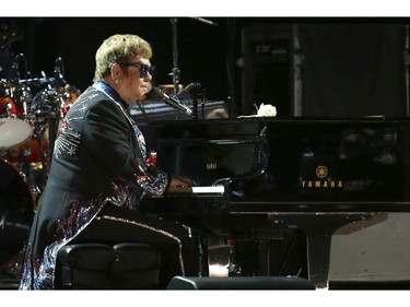 Elton John performs "Tiny Dancer" at the 60th annual Grammy Awards at Madison Square Garden on Sunday, Jan. 28, 2018, in New York. (Matt Sayles/Invision/AP)