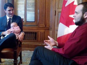 Prime Minister Justin Trudeau appears with members of the Boyle family on Parliament Hill in Ottawa in pictures posted Dec. 19, 2017 to a Twitter account attributed to the family of released Afghan hostage Joshua Boyle.