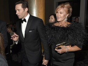 Hugh Jackman, left, and Deborra-Lee Furness attend the 75th annual Golden Globe Awards at the Beverly Hilton Hotel on Sunday, Jan. 7, 2018, in Beverly Hills, Calif.