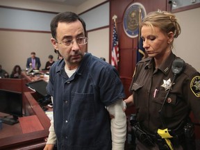 Larry Nassar appears in court to listen to victim impact statements prior to being sentenced after being accused of molesting about 100 girls while he was a physician for USA Gymnastics and Michigan State University, where he had his sports-medicine practice on January 16, 2018 in Lansing, Michigan.
