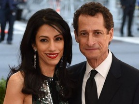 This file photo taken on May 2, 2016 shows Anthony Weiner and Huma Abedin as they arrive at the Costume Institute Benefit at The Metropolitan Museum of Art  in New York. Huma Abedin, the wife of the former New York Representative Anthony D. Weiner, announced on August 29, 2016 that the couple were separating in the wake of a report that Mr. Weiner had been involved in another sexting scandal. / AFP PHOTO / TIMOTHY A. CLARYTIMOTHY A. CLARY/AFP/Getty Images