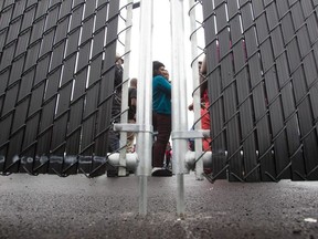 Refugees who crossed the Canada/US border illegally wait in a temporary detention centre in Blackpool, Quebec, August 5, 2017.