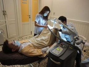 This promotional handout from 2016 and received by AFP on January 4, 2018 from Lelux Hospital shows a man undergoing a penis whitening procedure at the Bangkok branch of Lelux Hospital. The Bangkok clinic that has drawn 100 men a month to its penis whitening service has caused a stir in Thailand, with social media users both baffled and alarmed by the phallic fad. The Lelax Hospital, renowned for its body whitening expertise in a country obsessed with skin colour, began offering the unconventional treatment six months ago after a male customer complained of "dark parts" on his groin.