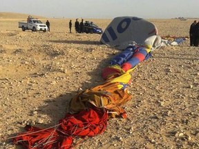 The remains of a hot air balloon are seen on the ground near the ancient city of Luxor after a fatal crash on January 5, 2018.