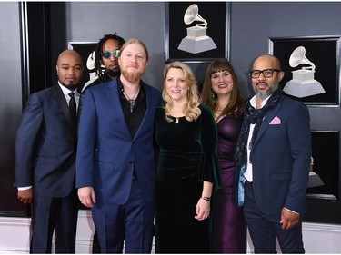 Derek Trucks (centre L), Susan Tedeschi (centre R), and The Tedeschi Trucks Band arrive for the 60th Grammy Awards on Jan. 28, 2018, in New York City. (ANGELA WEISS/AFP/Getty Images)