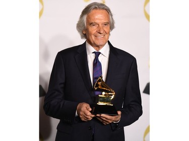 Guitarist John McLaughlin, winner of Best Improvised Jazz Solo, poses in the press room during the 60th Annual Grammy Awards 
on Jan. 28, 2018, in New York. (DON EMMERT/AFP/Getty Images)