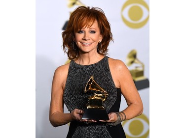 Reba McEntire, winner of the Best Roots Gospel Album award for "Sing It Now: Songs of Faith & Hope," poses in the press room during the 60th Annual Grammy Awards on Jan. 28, 2018, in New York. (DON EMMERT/AFP/Getty Images)