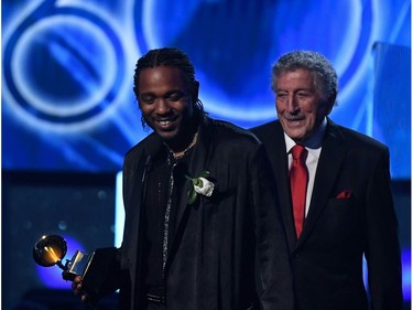 Kendrick Lamar is seen with Tony Bennett (R) after receiving a Grammy for the Best Rap song from Rihanna during the 60th Annual Grammy Awards show on Jan. 28, 2018, in New York. (TIMOTHY A. CLARY/AFP/Getty Images)