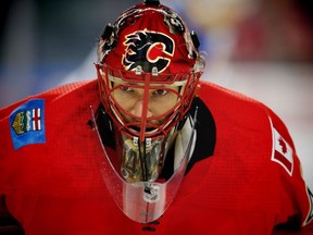 Flames Hockey Calgary Flames goaltender Mike Smith during the pre-game skate before facing the St. Louis Blues in NHL hockey at the Scotiabank Saddledome in Calgary on Monday, November 13, 2017. Al Charest/Postmedia Postmedia Calgary AL Charest, Al Charest/Postmedia