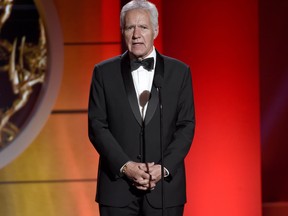 Longtime "Jeopardy" host Alex Trebek had surgery for blood clots on the brain, but says he'll be back behind the podium soon.