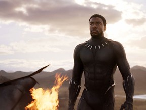 This image released by Disney and Marvel Studios' shows Chadwick Boseman in a scene from "Black Panther," in theaters on Feb. 16, 2018. (Marvel Studios/Disney via AP)